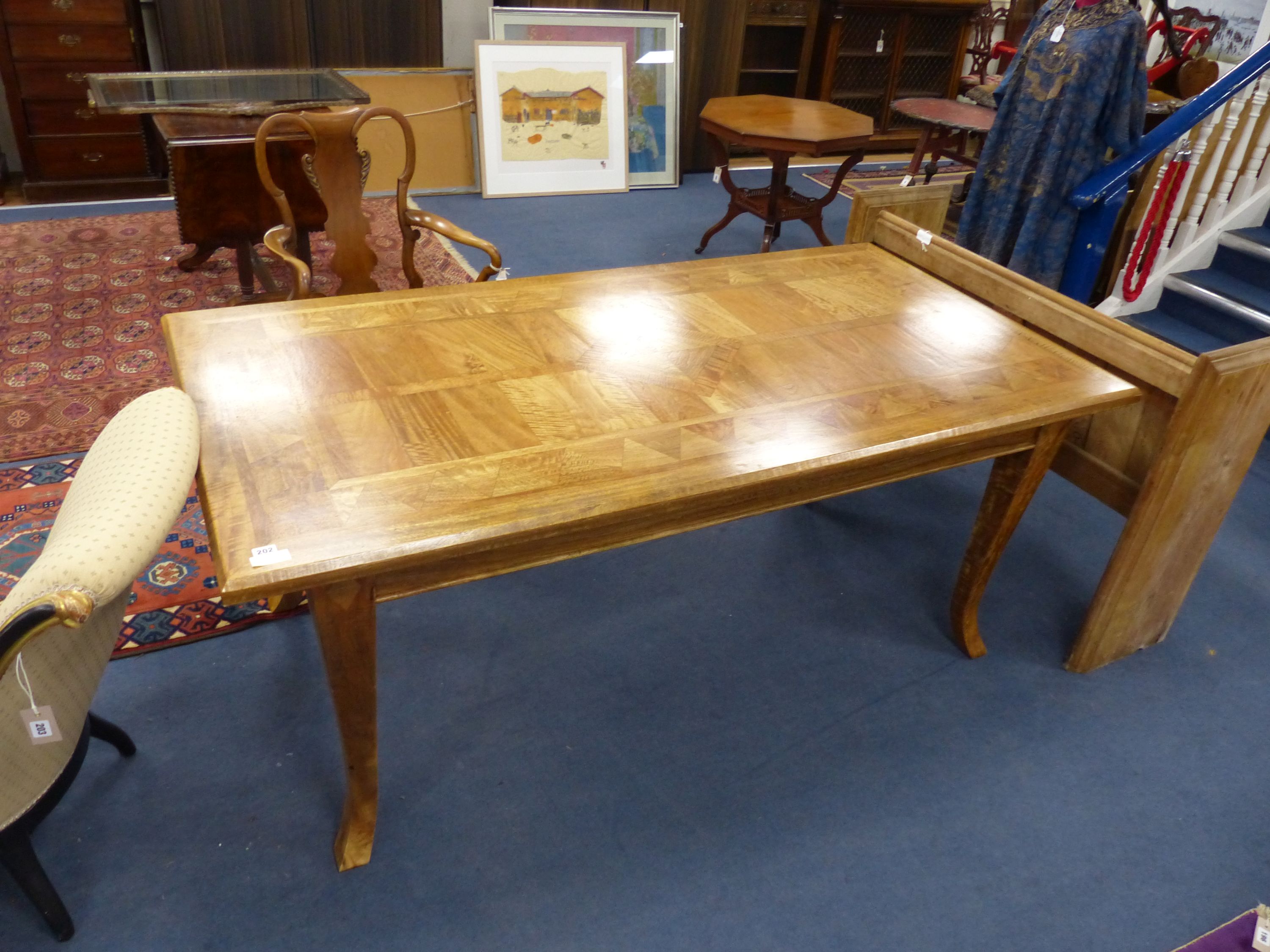 A rectangular Continental parquetry dining table, length 180cm, depth 90cm, height 75cm